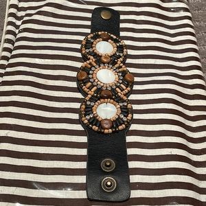 Ladies Tommy Bahama black leather beaded and rhinestone bracelet.